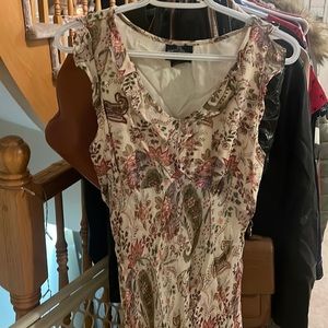 Beautiful cream and floral dress designer is Angie